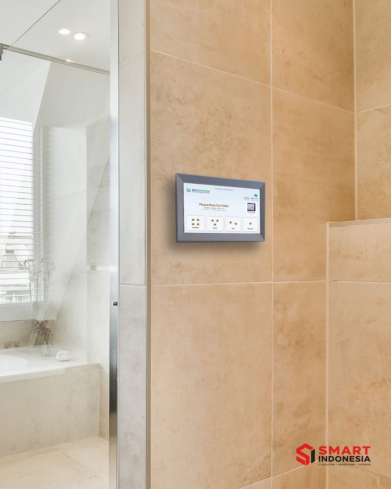 Tablet SmartSanitasi terpasang di dinding toilet BPJS Kesehatan
